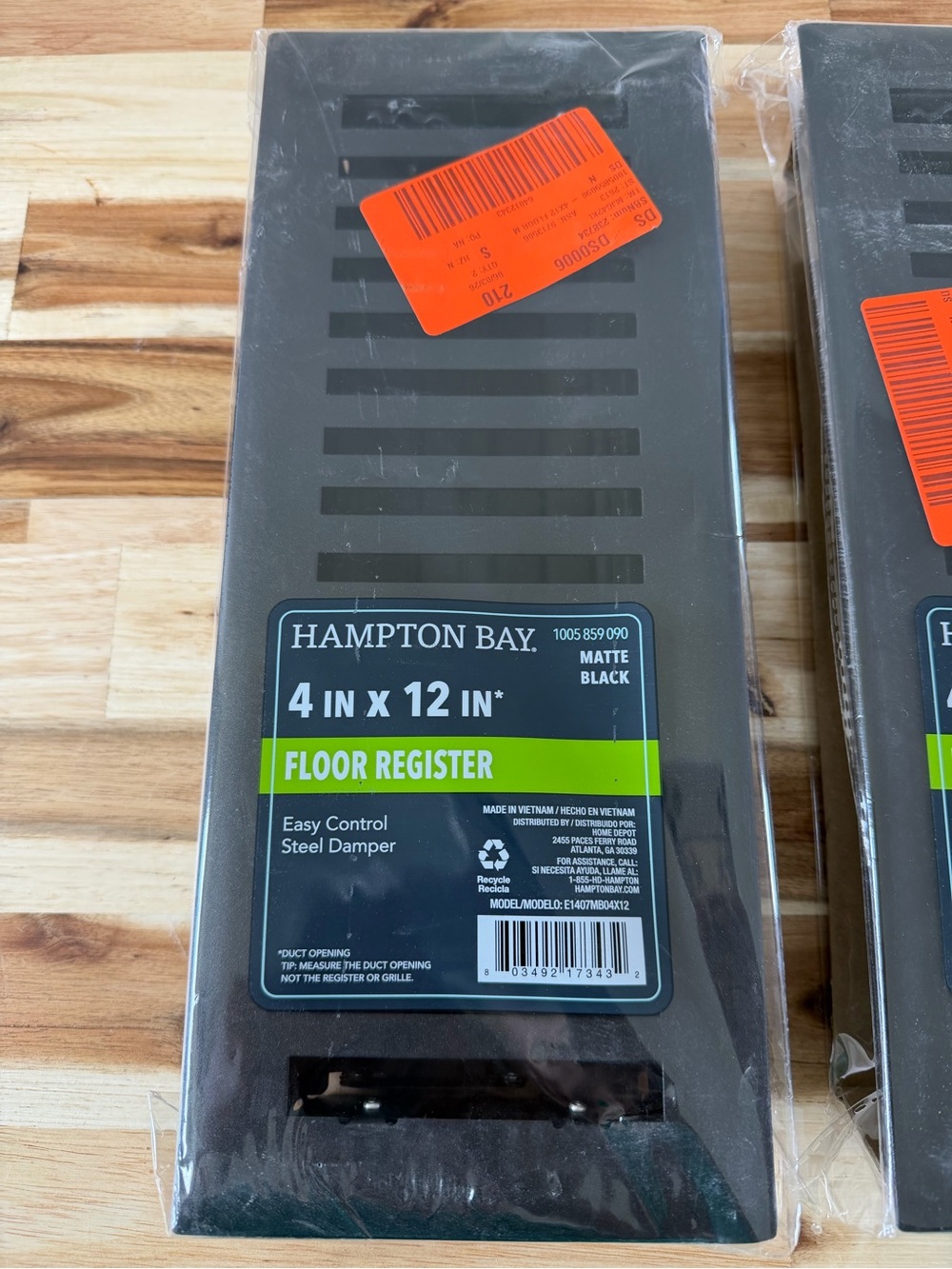 New Hampton Bay Matte Black 4 x 12 in Floor Register